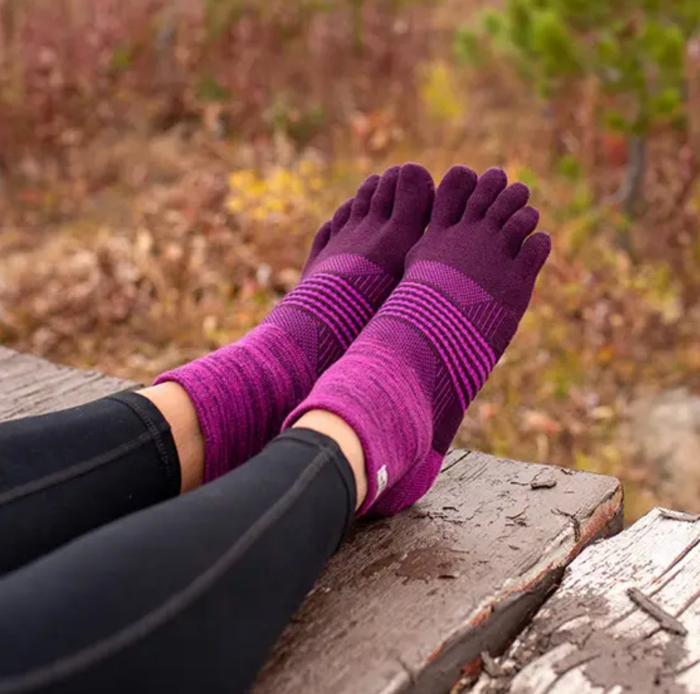 Woman wearing Injinji Women’s Trail MW  Mini Crew
